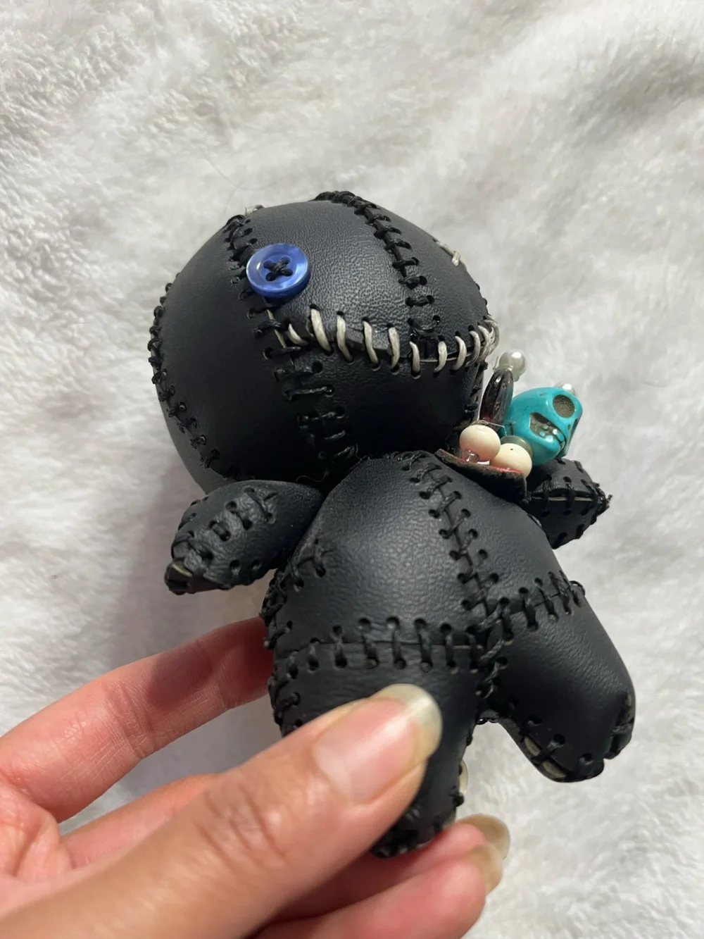 Black Stitched Voodoo Doll Keychain with Turquoise Skull Charm